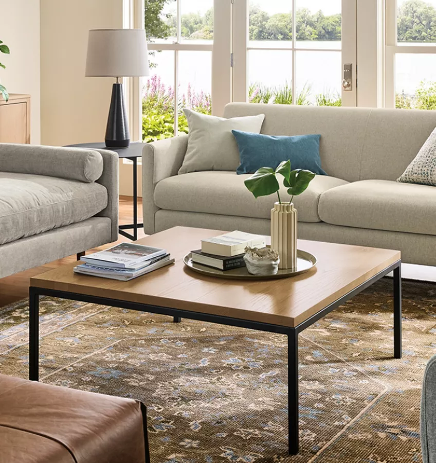 Clean modern living room with sofas and a coffee table ready for furniture removal